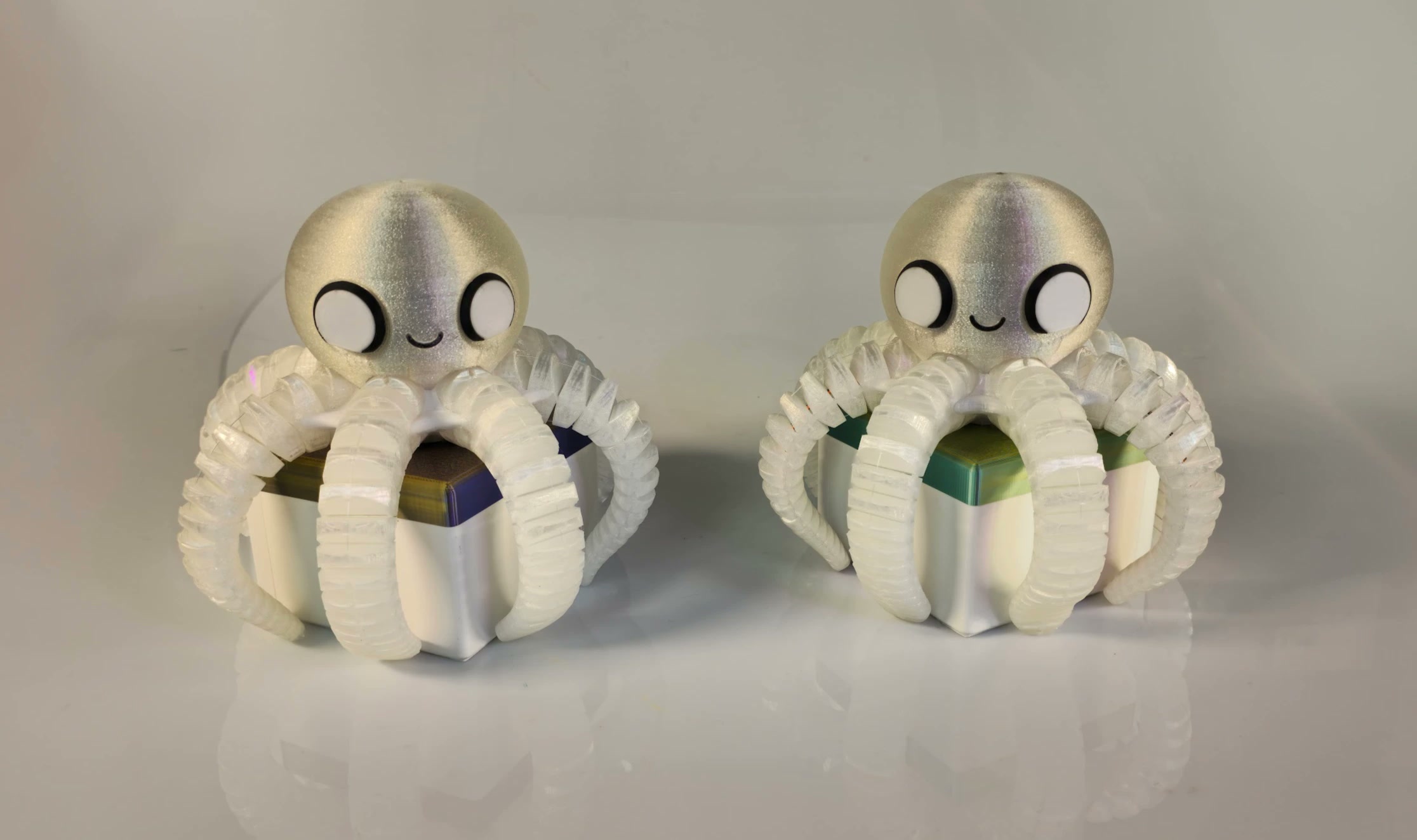 Two Octoping companions side by side